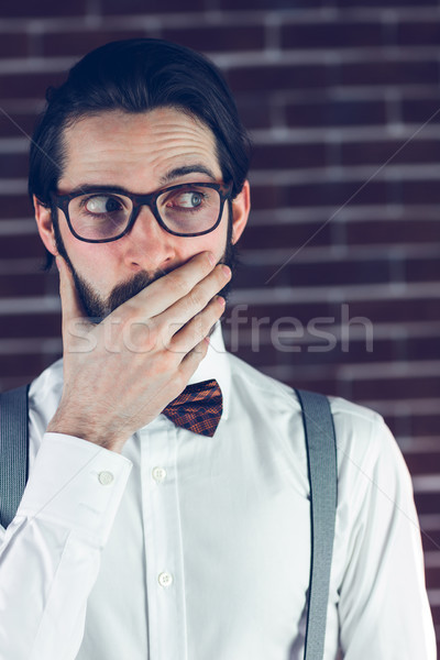 Nervous man covering mouth Stock photo © wavebreak_media