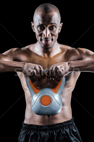 Portret muscular om kettlebells negru Imagine de stoc © wavebreak_media