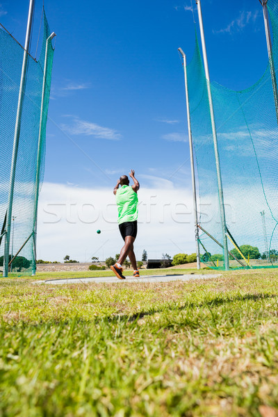 Stock photo: Athlete performing a hammer throw