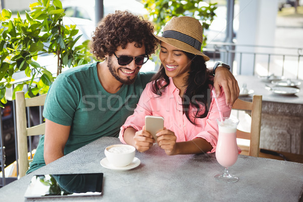 Couple looking at mobile phone Stock photo © wavebreak_media