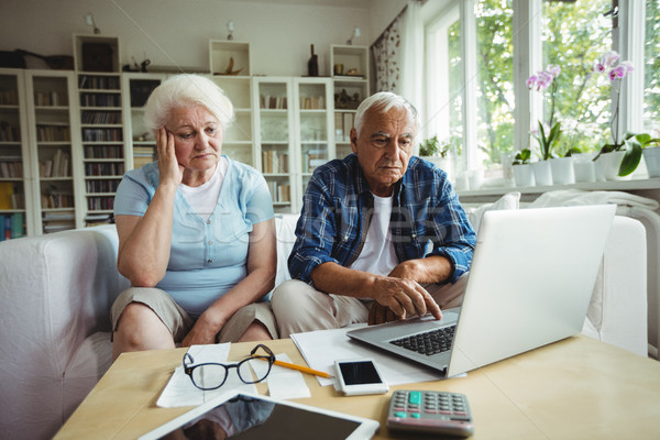 Worried senior couple using laptop Stock photo © wavebreak_media