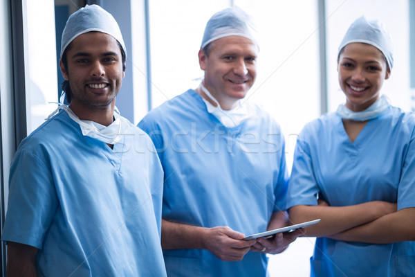 Surgeons discussing over digital tablet Stock photo © wavebreak_media