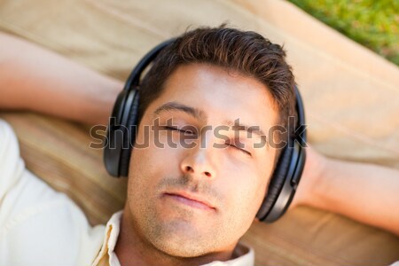 Close-up of a relaxed young woman listening music in a bubble ba Stock photo © wavebreak_media