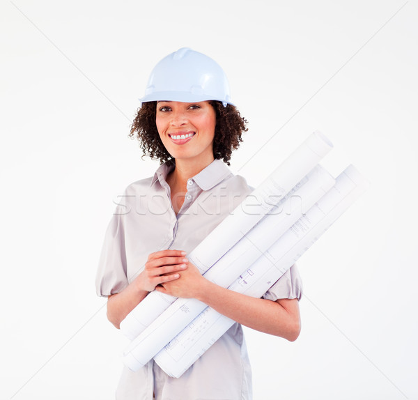 Smiling woman holding construction plans Stock photo © wavebreak_media