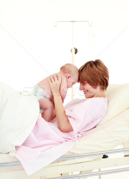 Mother embracing her newborn baby Stock photo © wavebreak_media