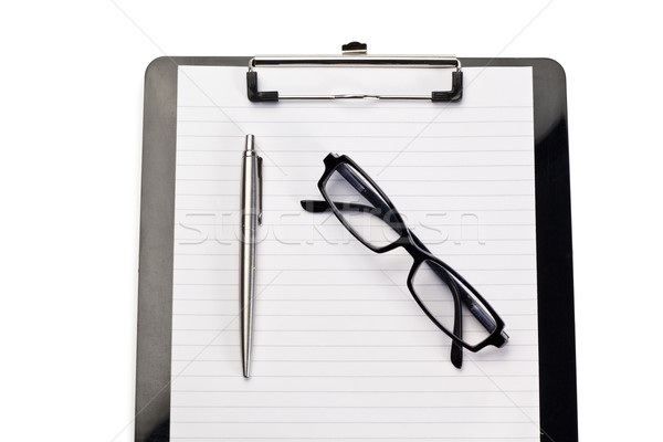 Note pad, pen and glasses on a white background Stock photo © wavebreak_media