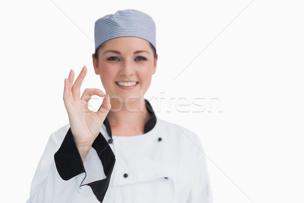 Chef giving the ok sign on white background Stock photo © wavebreak_media