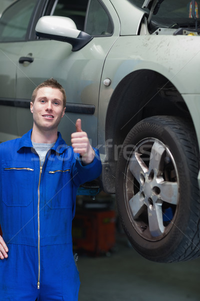 Car mechanic gesturing thumbs up Stock photo © wavebreak_media