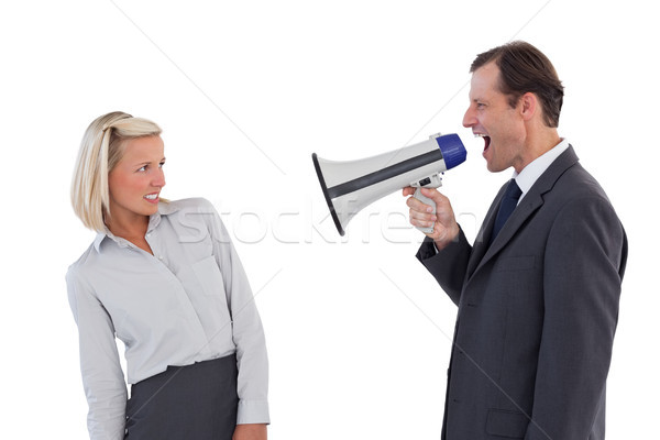 Businessman shouting at colleague with his megaphone Stock photo © wavebreak_media