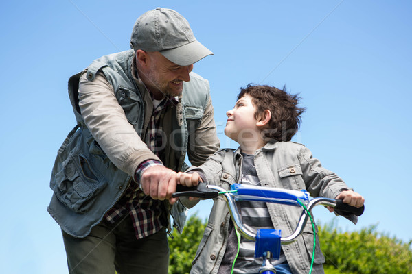 Vader zoon fiets gelukkig zomer jongen fiets Stockfoto © wavebreak_media