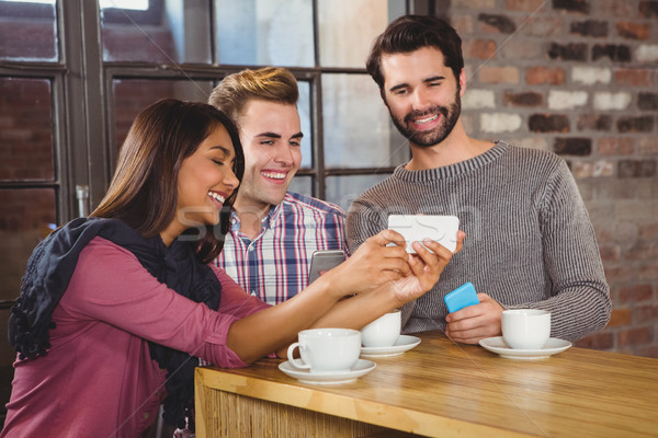 Foto stock: Grupo · amigos · olhando · café · negócio