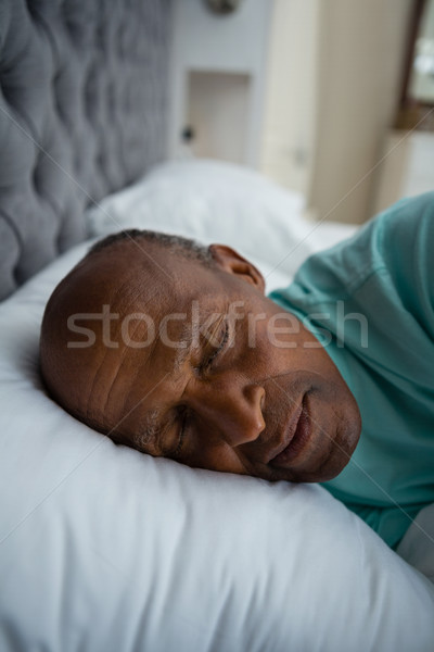 Közelkép idős férfi alszik ágy otthon Stock fotó © wavebreak_media