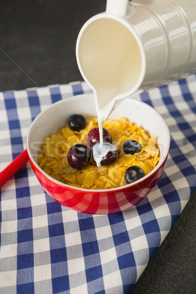 Latte ciotola cereali nero fitness frutta Foto d'archivio © wavebreak_media
