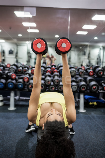 Fit woman working out in weights room Stock photo © wavebreak_media