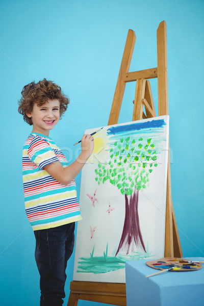 Happy boy painting his picture Stock photo © wavebreak_media