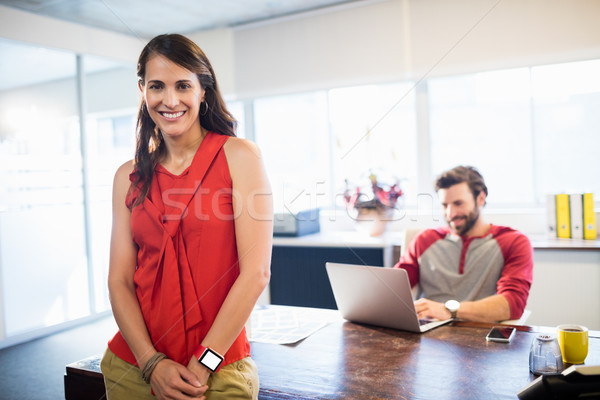 Smiling colleagues working Stock photo © wavebreak_media