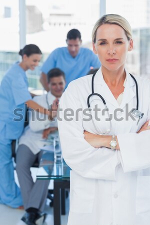Doctor writing prescription in file Stock photo © wavebreak_media