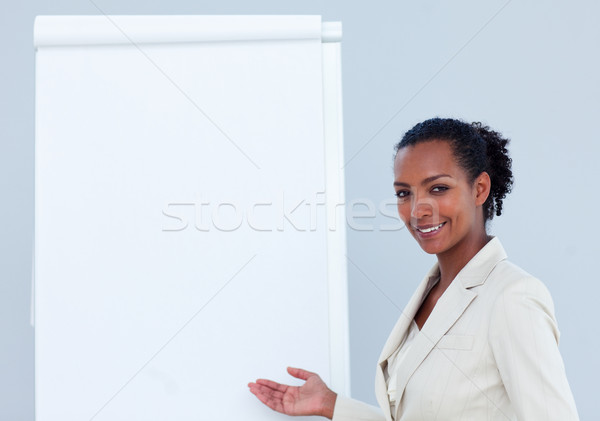 Positive businesswoman giving a presentation Stock photo © wavebreak_media