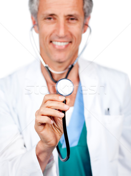 Attractive doctor presenting his stethoscope  Stock photo © wavebreak_media