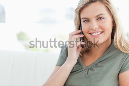 Femme regarder souriant appel maison mobiles [[stock_photo]] © wavebreak_media