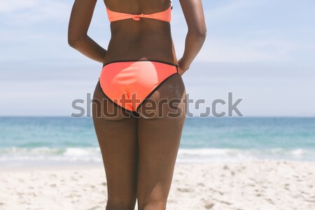 Mulher jovem em torno de cintura praia Foto stock © wavebreak_media