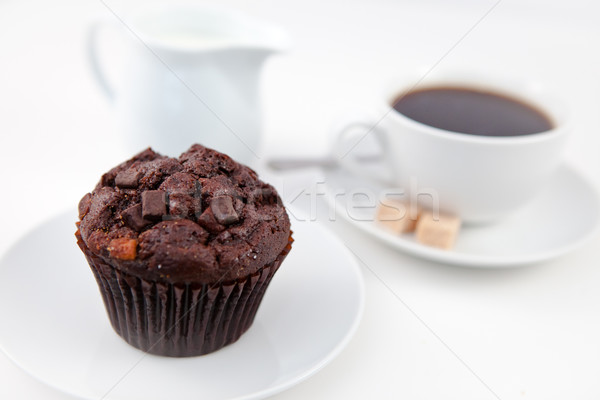 Chocolate muffin taza café blanco placas Foto stock © wavebreak_media