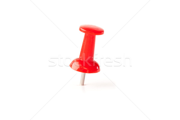 Close up of a red push pin against a white background Stock photo © wavebreak_media