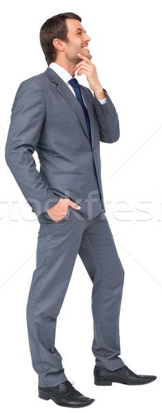 Thinking businessman touching his chin Stock photo © wavebreak_media