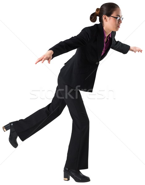 Businesswoman stepping and balancing Stock photo © wavebreak_media