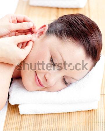 Beautiful blonde enjoying a hot stone massage  Stock photo © wavebreak_media