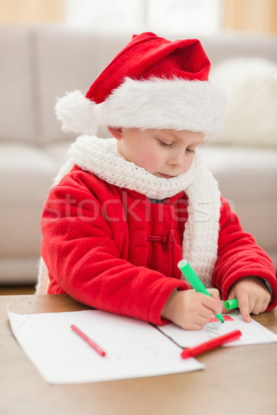 Festive little boy drawing pictures Stock photo © wavebreak_media