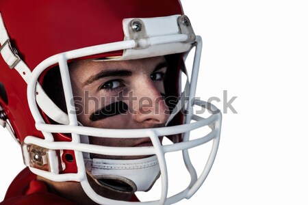 Man in helmet against dark grey background Stock photo © wavebreak_media