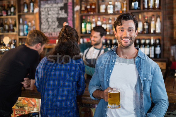 [[stock_photo]]: Portrait · souriant · homme · bière · mug