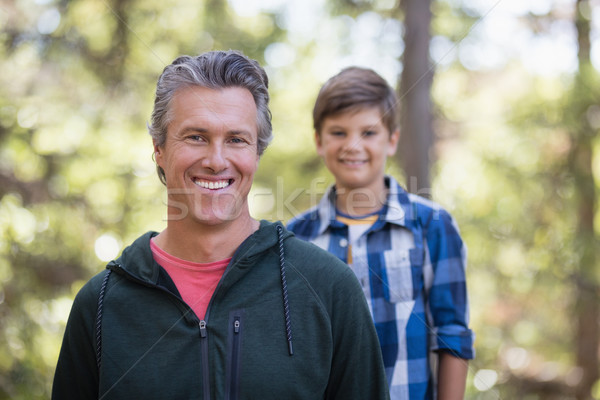 Happy father and son hiking in forest Stock photo © wavebreak_media