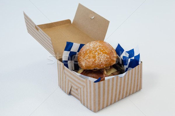 Hamburger departe recipient alb Imagine de stoc © wavebreak_media