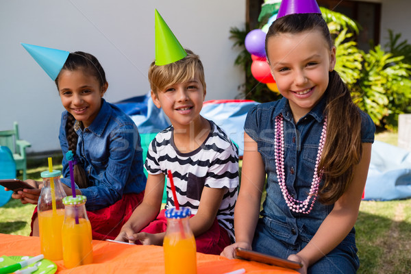 Portrait of smiling children during birthday party Stock photo © wavebreak_media