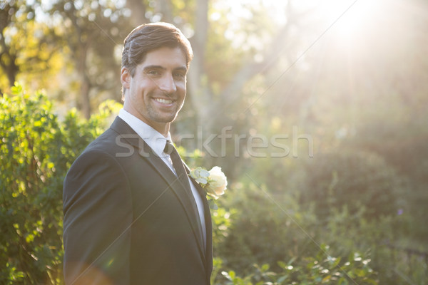 Portrait of handsome bride standing by plants Stock photo © wavebreak_media