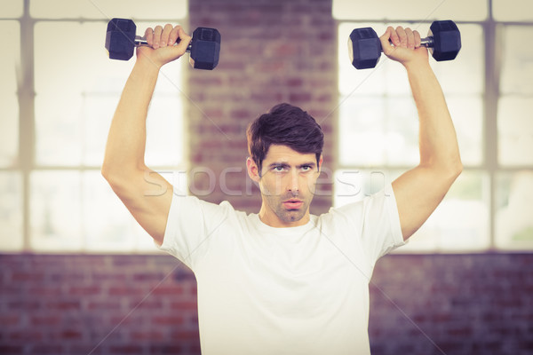 Retrato muscular homem halteres crossfit Foto stock © wavebreak_media