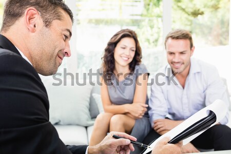 Stock photo: Young couple ready to buy new house