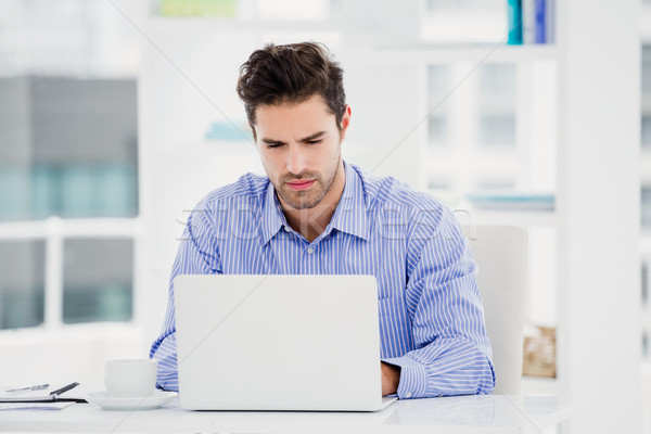 Businessman working on laptop Stock photo © wavebreak_media