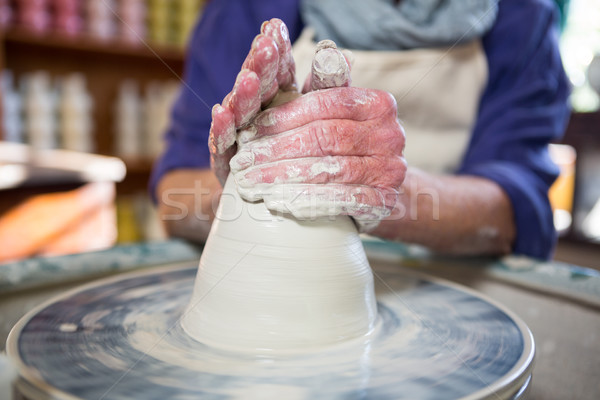 Mid section of female potter making pot Stock photo © wavebreak_media