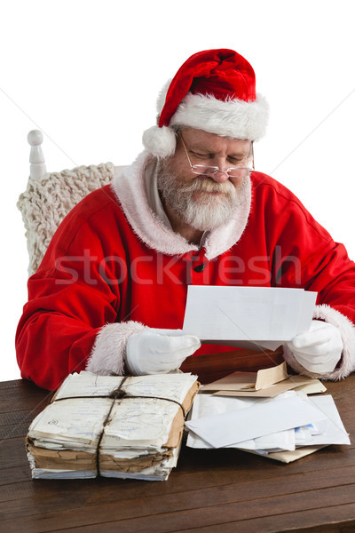 Santa claus reading a letter Stock photo © wavebreak_media