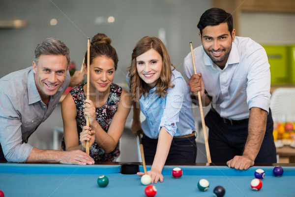 Lächelnd Business Kollegen spielen Pool Büro Stock foto © wavebreak_media