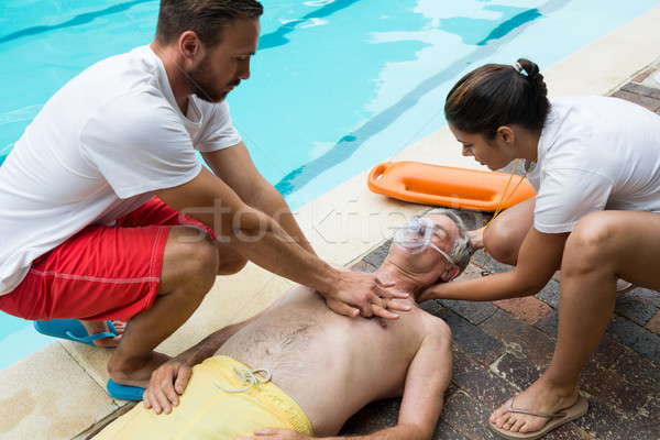Brust bewusstlos Senior Mann Wasser Stock foto © wavebreak_media