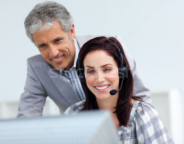 Mature manager checking his employee's work  Stock photo © wavebreak_media