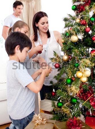 Gelukkig gezin kerstboom familie glimlach man home Stockfoto © wavebreak_media