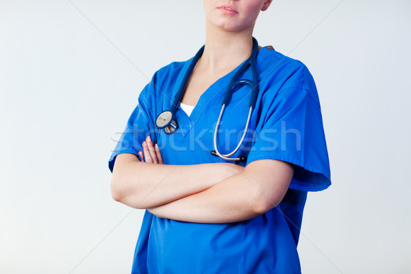 Doctor with standing before camera Stock photo © wavebreak_media