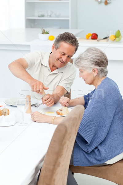 Stockfoto: Gepensioneerd · paar · eten · keuken · huis · gelukkig