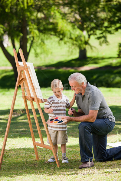 Grand-père petit-fils peinture jardin heureux art Photo stock © wavebreak_media