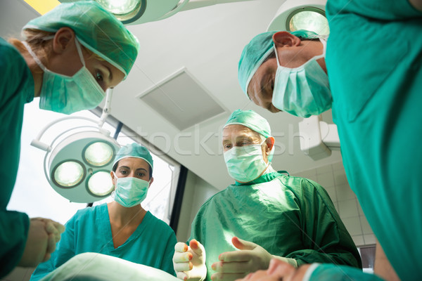 Chirurgiczny zespołu pracy krwawienie pacjenta pokój Zdjęcia stock © wavebreak_media